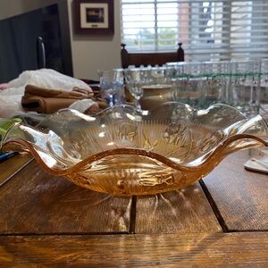 A vintage Jeannette Glass "Iris and Herringbone" iridescent carnival glass bowl